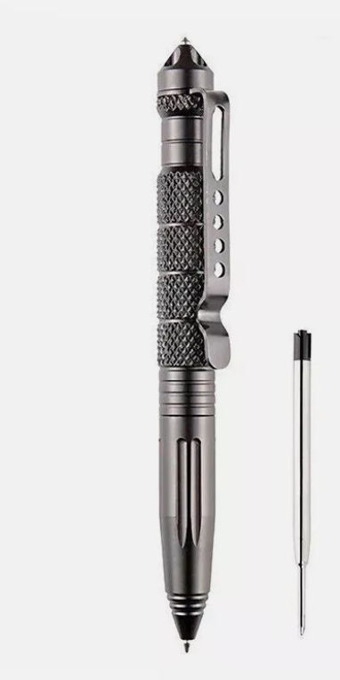 The Op Gear Tactical Pen - Recon, a black self-defense tool with a textured grip and clip, is displayed beside a silver ink refill on a white background.