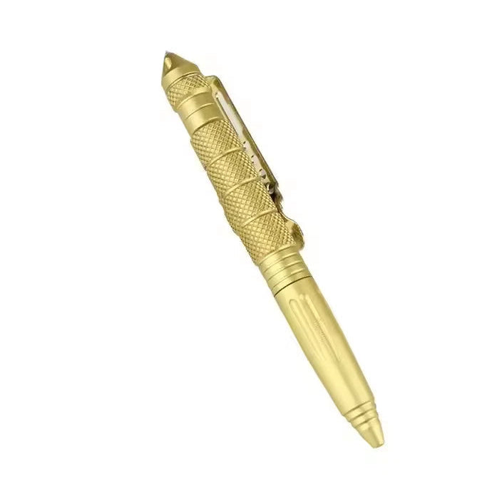 Gold pen with textured design on a white background