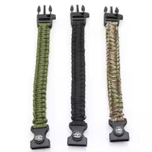Three paracord straps with black buckles on a white background